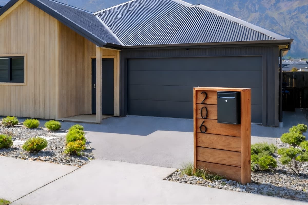 Designer wooden letterbox on a porch